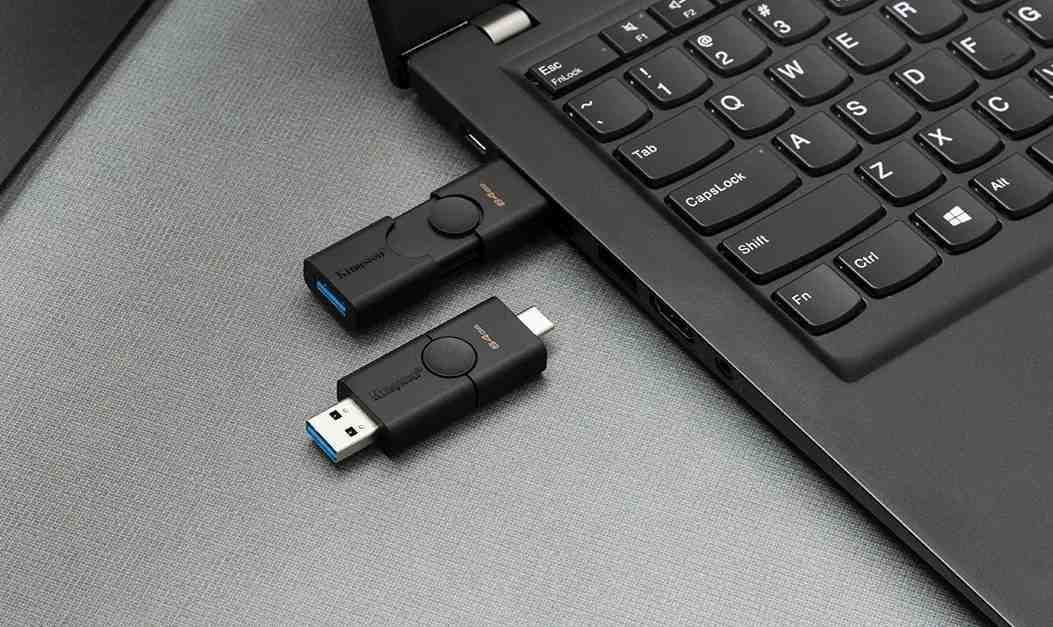 Melepaskan perangkat USB dari laptop untuk memperbaiki kegagalan booting.